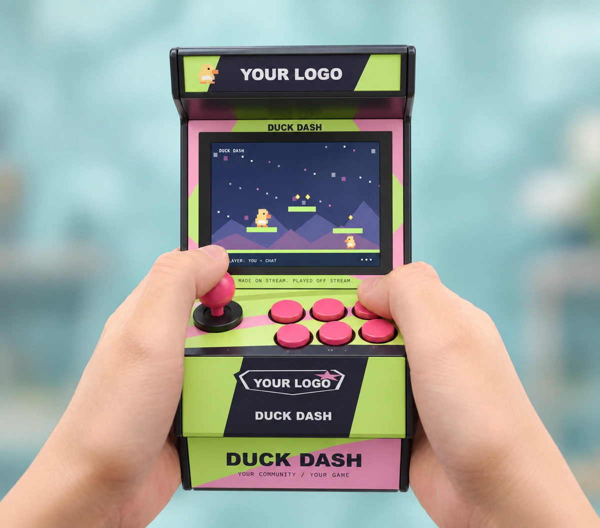 Hands playing a Duck Dash Mini VibeConsole, wrapped in original game artwork and YOUR LOGO creator branding